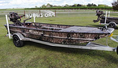 shallow water boat with camo paint